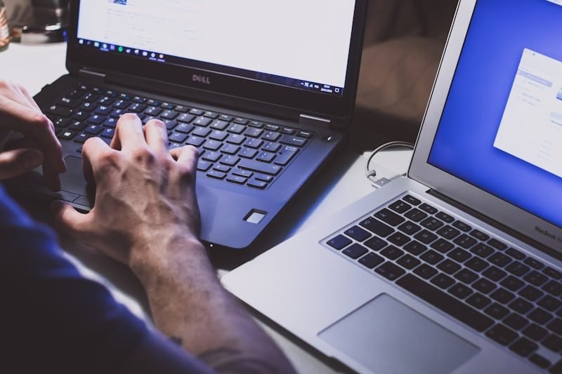 Technician working on a computer in an office